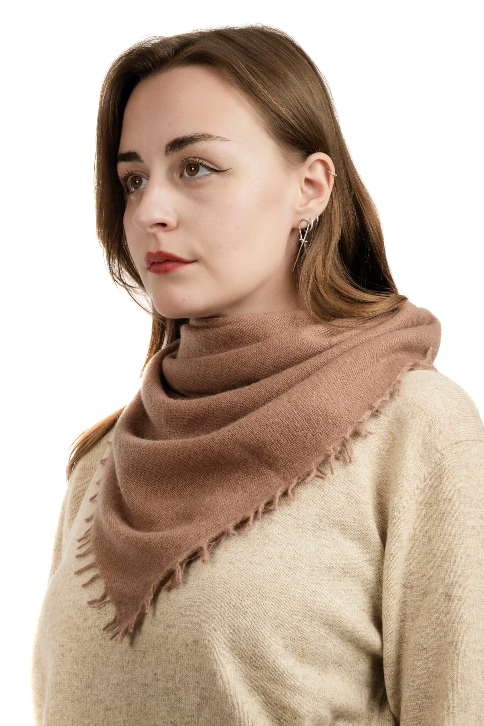 A cashmere scarf worn